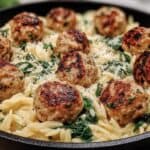 Lemony Chicken Ricotta Meatballs Over Garlic Spinach Orzo